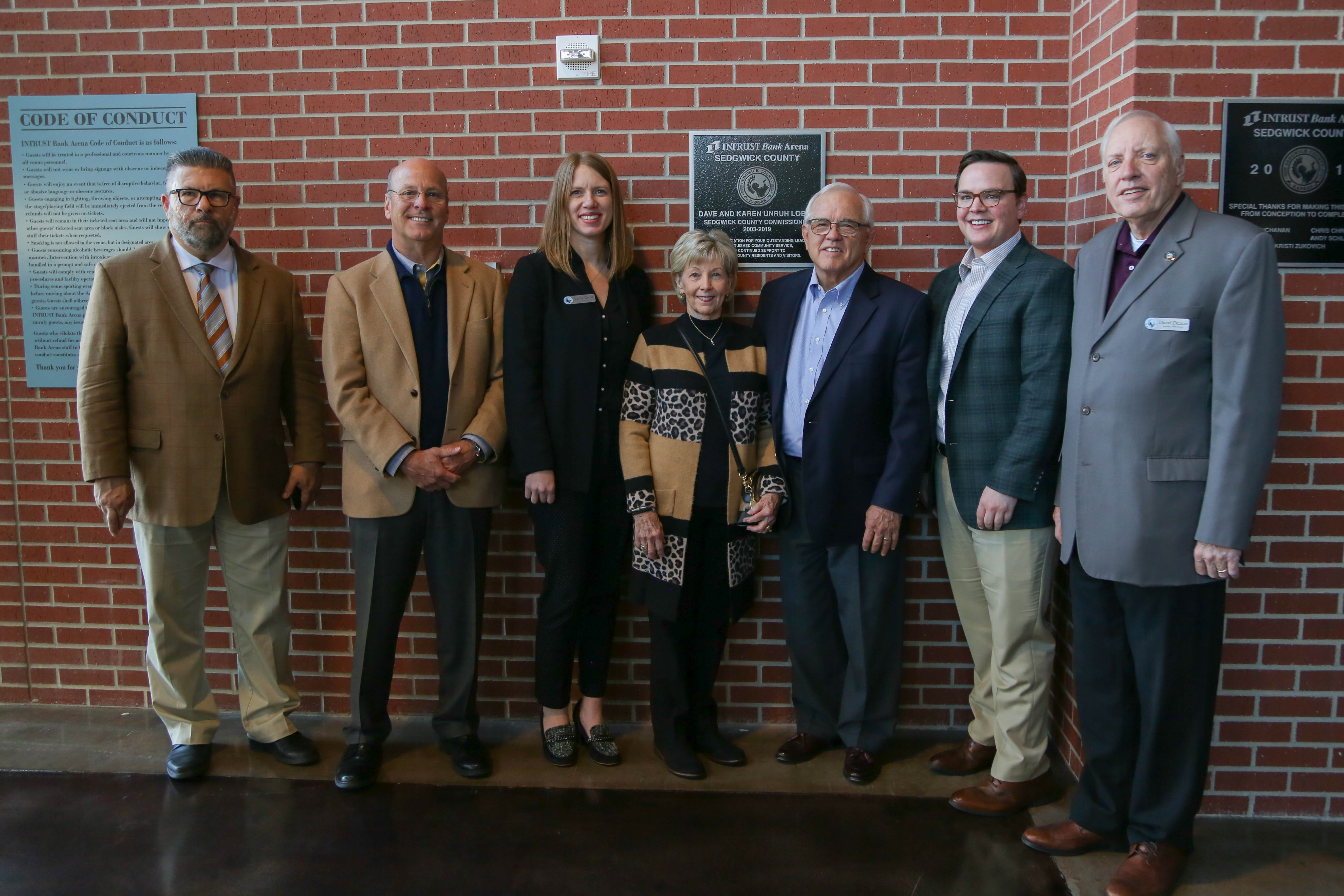 Commissioners posing with Dave and Karen Unruh.