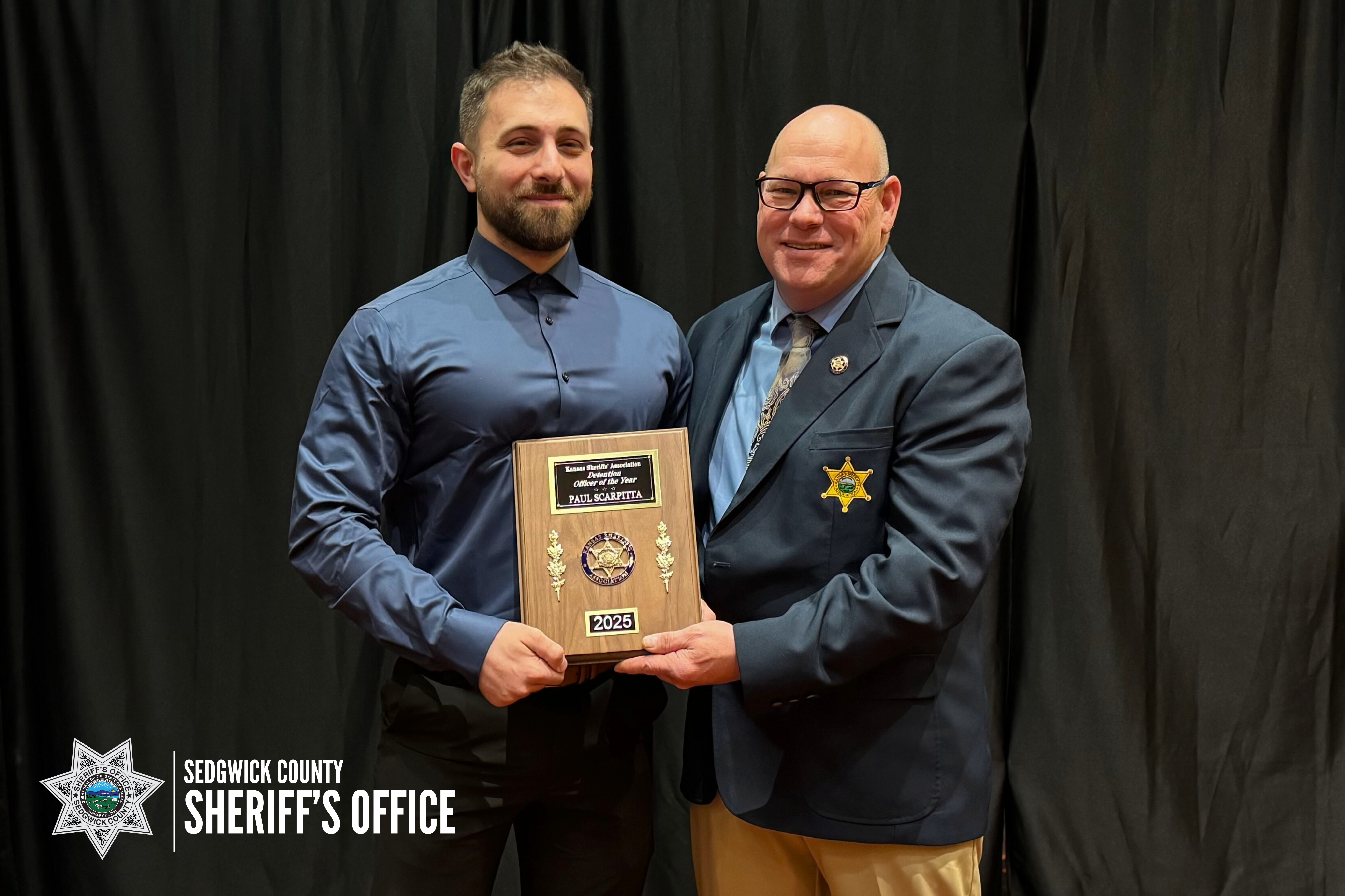 Deputy Paul Scarpitta receiving award
