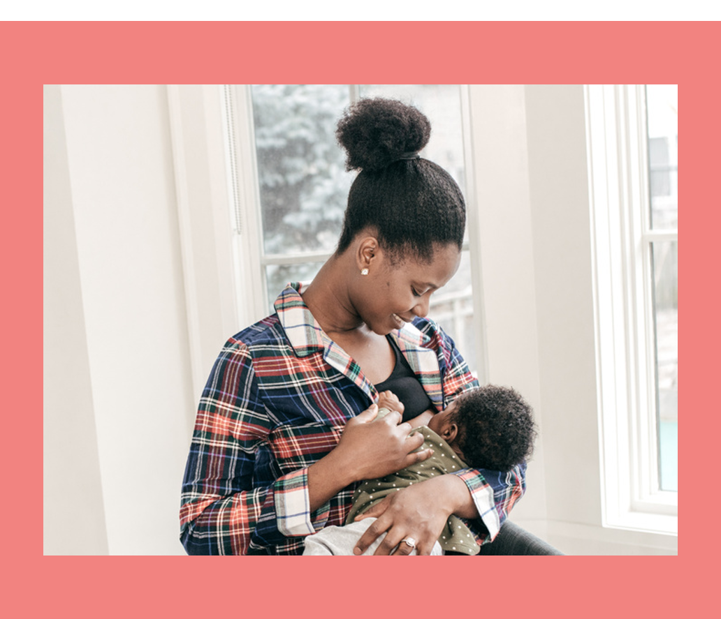 mother breastfeeding new baby
